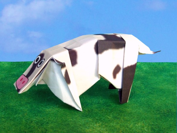 funny origami cow with tail and ears