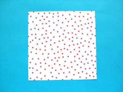 origami paper with red polka dot pattern