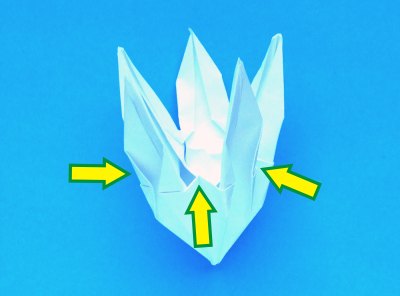 instructions for folding an origami lily with five petals