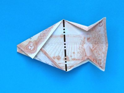 folding a money origami giraffe