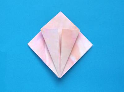 folding a beautiful pink origami flower