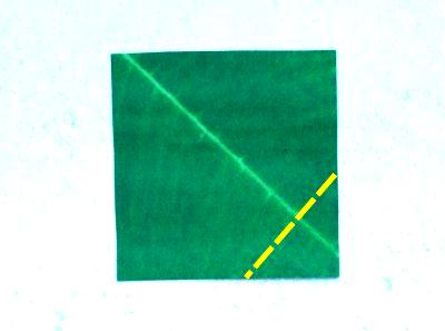 green coloured origami paper for folding a leaf green coloured origami paper for folding a leaf