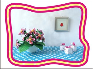 knutselkaartje met roze bloemen en schattige doosjes
