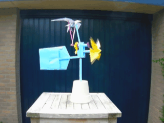 mechanical origami wind vane with flapping bird