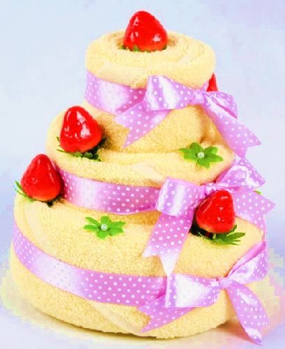 towel origami cake with pink bows