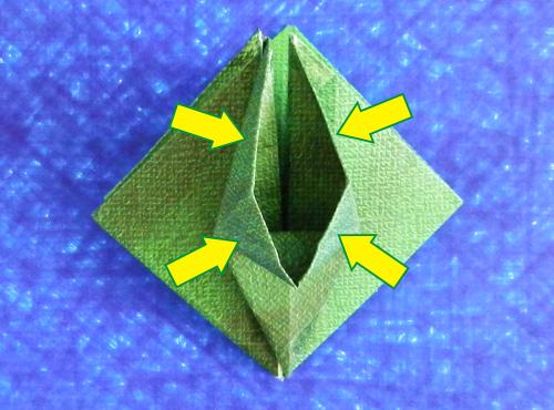 een Origami kever van papier maken