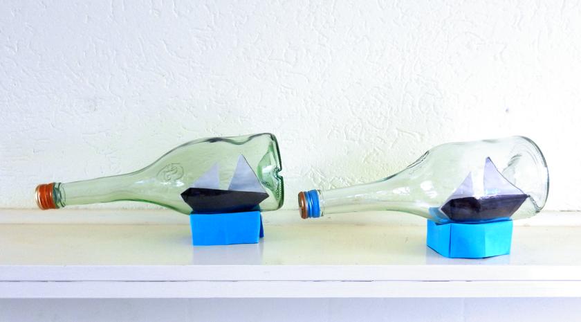 Origami boats in a bottle