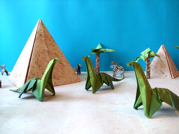 cute origami brontosaurs in the desert