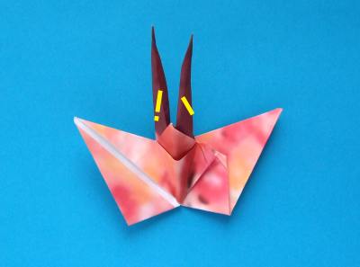 uitleg om een origami vlinder te vouwen