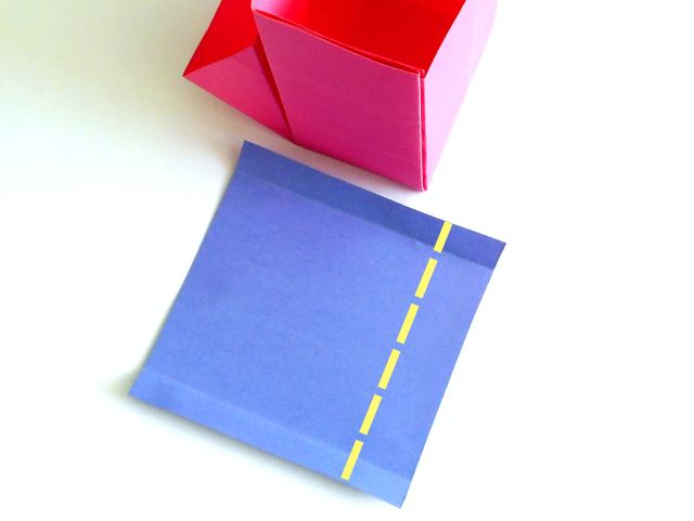 Make a paper candy dispenser