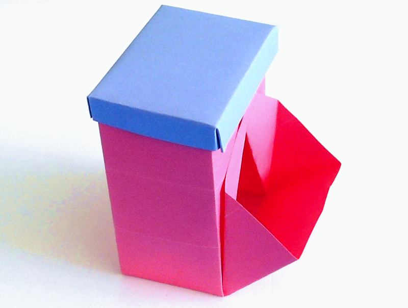 Origami candy dispenser