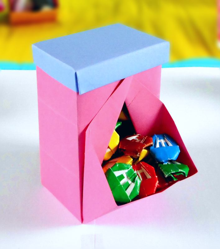 Origami candy dispenser