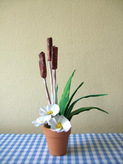 origami flower-arrangement with primroses and cattails