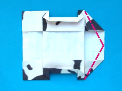 een origami koe met papier knutselen