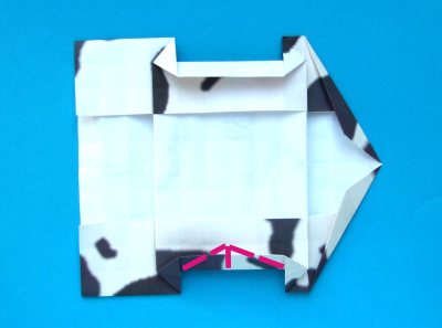 een origami koe met papier knutselen