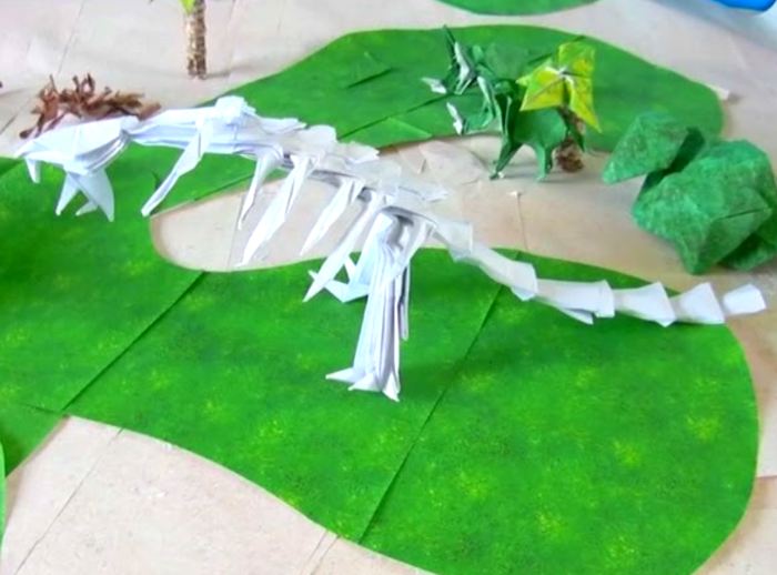 origami velociraptor dino skelet van papier