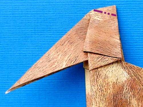 Een Origami hond vouwen