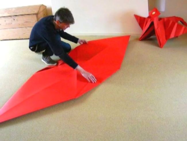 Folding a large Origami Dragon