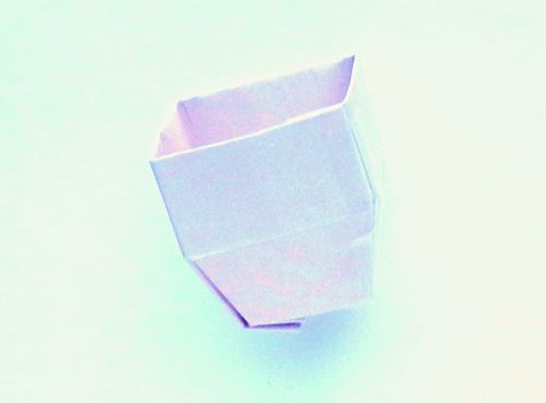 Folding an Origami Egg Shaped Box