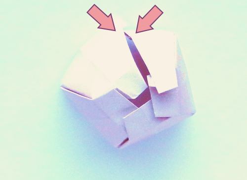 Folding an Origami Egg Shaped Box