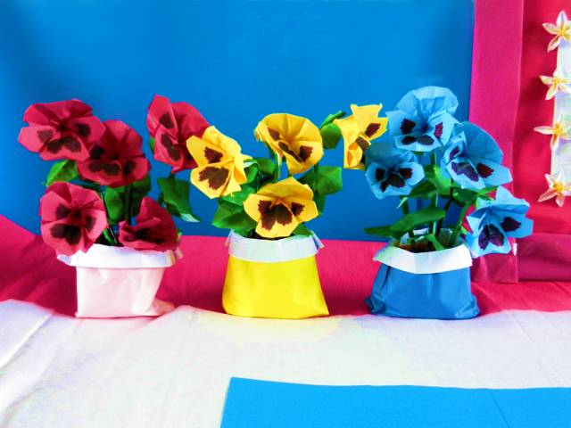 Pansies in paper gift bags