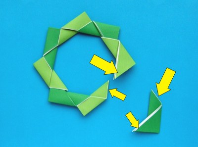 diagrams for a modular origami christmas wreath with a bow on it