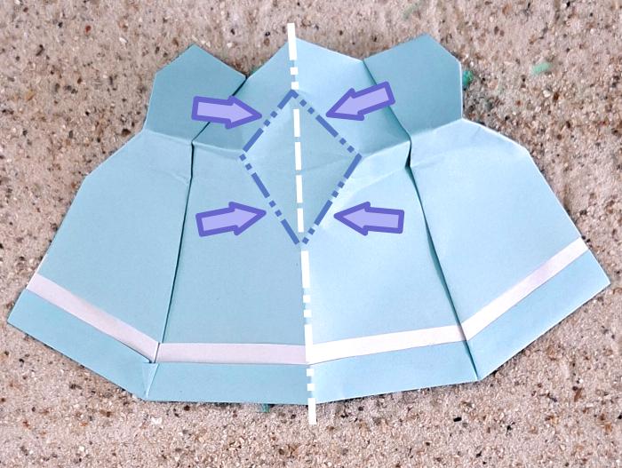Origami poppenjurk maken