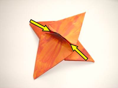 diagrammen voor een oranje origami bloemetje