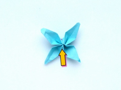 cute little origami flower with 4 petals