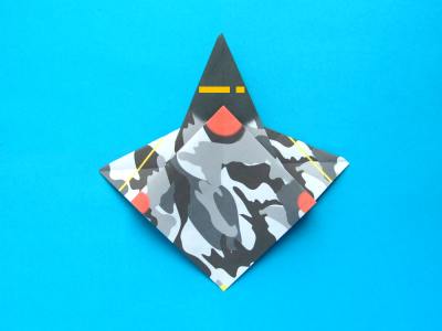 folding an origami plane - stunt fighter folding an origami plane - stunt fighter
