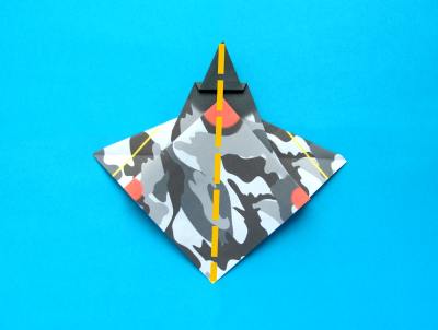 folding an origami plane - stunt fighter folding an origami plane - stunt fighter