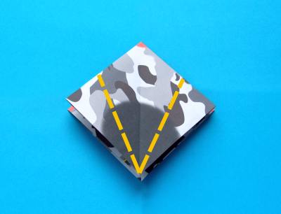 folding an origami plane - stunt fighter folding an origami plane - stunt fighter
