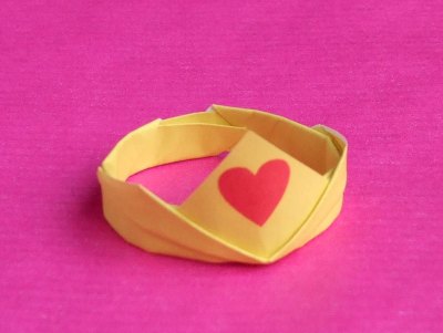 cute origami princess crown with a heart on the front