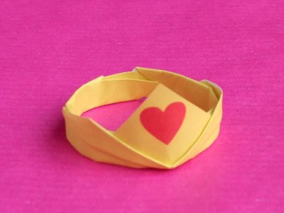 cute origami princess crown with a heart on the front cute origami princess crown with a heart on the front
