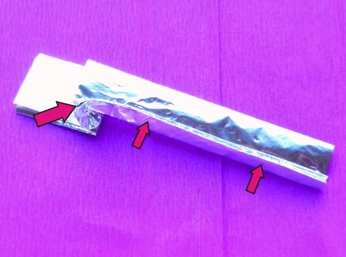 Een lepel knutselen van aluminiumfolie Een lepel knutselen van aluminiumfolie