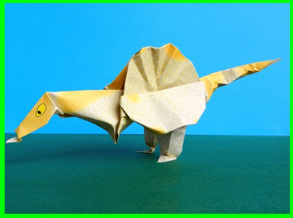 Stripfiguur achtig beeldje van een Spinosaurus