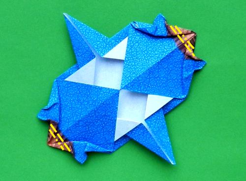 detailed instructions for folding an origami Stegosaurus