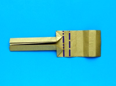 een goudkleurig zwaard van papier knutselen een goudkleurig zwaard van papier knutselen