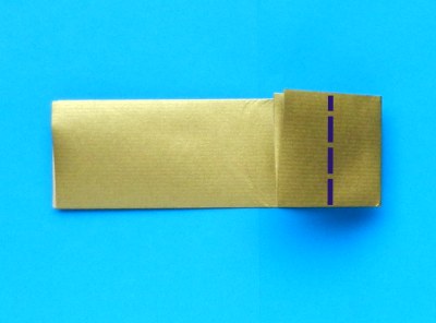 een goudkleurig zwaard van papier knutselen een goudkleurig zwaard van papier knutselen