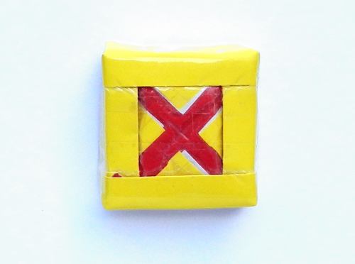 Origami tic tac toe block