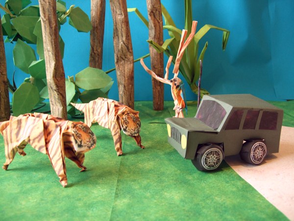 cool origami tigers standing in front of a jeep cool origami tigers standing in front of a jeep