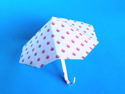cute origami umbrella with a pink flower pattern cute origami umbrella with a pink flower pattern