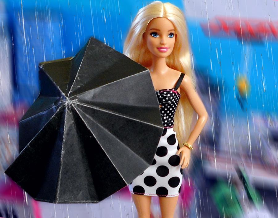 Fashion doll with umbrella