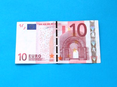 euro note for folding a tiny windmill