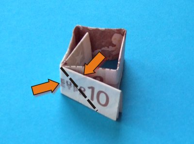 een origami molen van geld maken