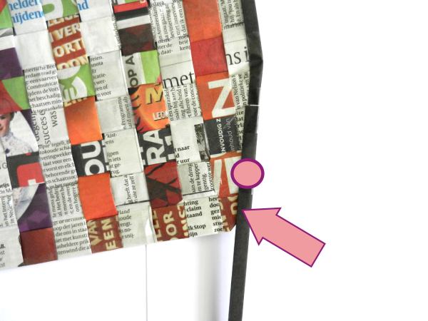 Make a woven newspaper clutch purse