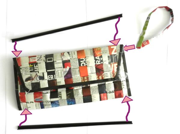 Make a woven newspaper clutch purse