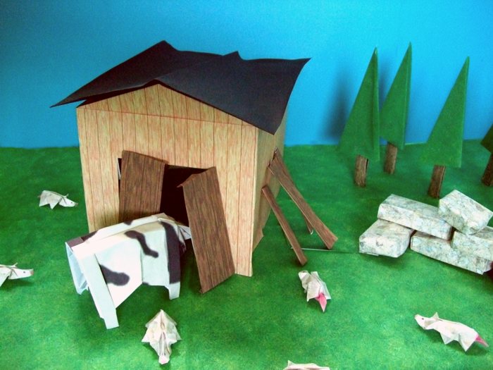 koe van papier die zijn hoofd in een schuurtje steekt koe van papier die zijn hoofd in een schuurtje steekt