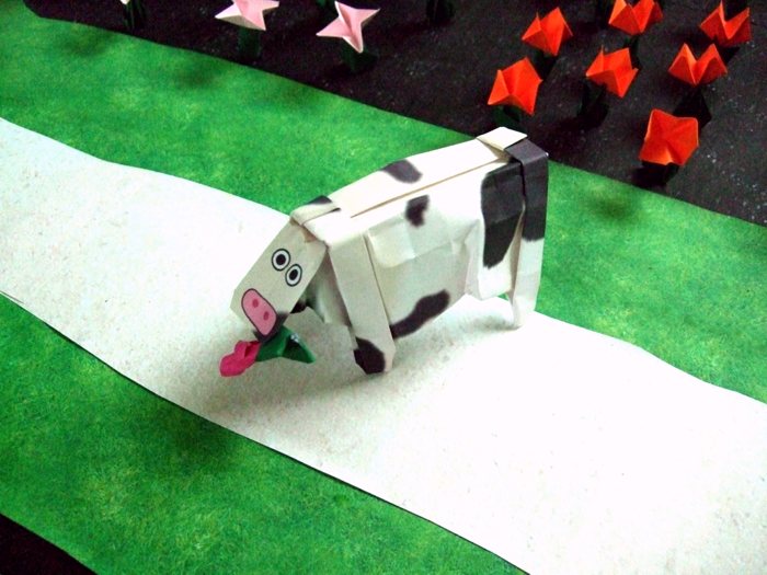 origami cow eating a flower origami cow eating a flower