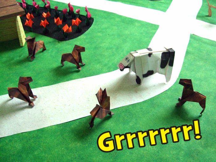 origami dogs looking at a cow origami dogs looking at a cow